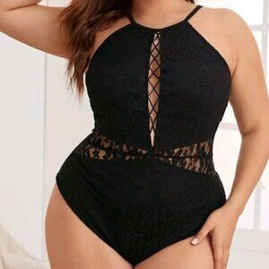 Black bodysuit with lace, elastic fabric, tight to the body